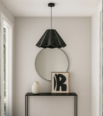 Origami-style black gray foam pendant hanging above modern hallway console