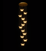 Luxury butterfly cascade chandelier hanging in double height foyer interior