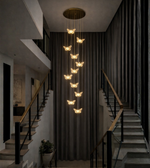 Luxury butterfly cascade chandelier hanging in double height foyer interior