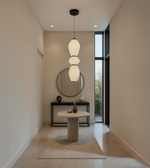 Luminous sculpture pendant by Daya Worldwide featuring a modern, illuminated decorative art piece with sleek design.