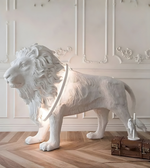 Daya Worldwide Regal Lion sculptural floor light statue with detailed lion design and modern lighting features.