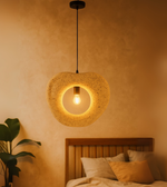 Beige modern foam pendant light hanging in a cozy interior space and cafes.
