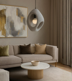 Loop-shaped grey foam pendant light glowing softly. Perfect for Cafes, Living Room and Dinning Table