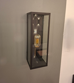 Modern black metal and glass outdoor wall light with decorative E27 bulb