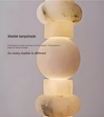 Close-up of natural marble lamp elements showing unique texture and veining