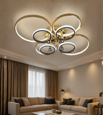Eclat rosegold modern LED ceiling light adding warmth to elegant living space.