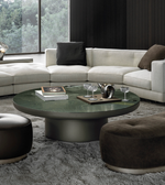 Round green coffee table by Daya Worldwide, featuring a smooth surface and modern design, perfect for living room decor.