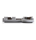 Daya Worldwide Luno Curve Sectional Sofa with plush cushions and modern design, showcasing its curved shape and stylish upholstery.
