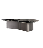 Marble sculptural coffee table with organic curves and polished finish, designed for modern living spaces.