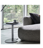 Eclipse side table by Daya Worldwide featuring a sleek round design with a smooth surface and modern aesthetic.