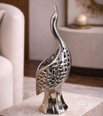 Silver wave bird sculpture decor by Daya Worldwide, featuring a sleek, modern design for stylish interior accents.