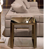 Elegant Aurora glass side table with clear glass top and sleek metal frame, ideal for modern living spaces.