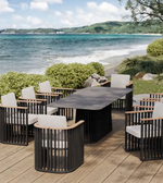 Outdoor rectangular dining set by Daya Worldwide featuring a table and matching chairs for outdoor dining.