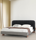 Elegant Daya Worldwide Stripe upholstered bed with a padded headboard and modern design, perfect for stylish bedrooms.