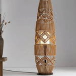 : Natural fiber woven lampshade detail in bohemian floor lamp