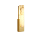 Designer gold wall light with marble diffuser on white background