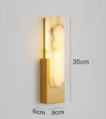 Vertical gold marble wall lamp with compact modern dimensions