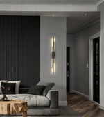 Modern vertical black LED wall light installed in living room