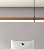 Apple device on a light gray surface with a wooden edge