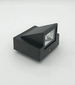 Black wall-mounted light fixture on a white background