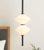 Modern pendant light fixture on a neutral background