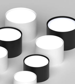 Black and white cylindrical lights arranged on a gray background