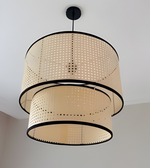 Ceiling light fixture with woven design on a neutral background