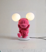 Cartoon-inspired pink mouse lamp front view with glowing orb lights