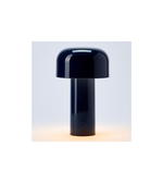 Close-up of glossy black dome shade table lamp