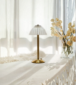 Ribbed glass shade table lamp in natural daylight