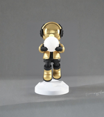 Front view of astronaut moon lamp with soft ambient light