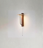 Wooden and metal wall light with circular shade in minimalist interior
