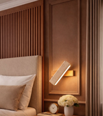 Minimal geometric wall light in luxury bedroom interior
