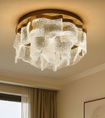 Ceiling light fixture with textured glass shade in a room setting