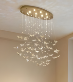 Modern chandelier with butterfly design on a ceiling