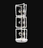 Decorative lamp with square glass panels on a black background