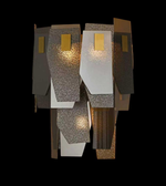 Modern wall-mounted light fixture with geometric design on a black background