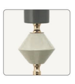 Decorative lamp with geometric design on a white background