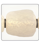 Modern wall light fixture with textured white glass shade on a clear background