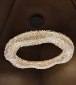 Decorative wreath made of pearls on a dark surface