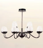 A six-light chandelier with a dark bronze metal frame and textured white glass shades, shown against a plain beige background.