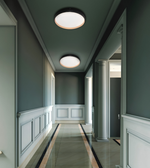 Modern black waved edge LED ceiling light with matte black textured frame and frosted diffuser for hallways, bedrooms, offices, and contemporary interiors.