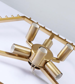 Gold ceiling light fixture on a white background