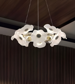 Modern chandelier with floral design hanging from the ceiling.
