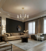 Modern living room with beige sofa, chandelier, and large windows.