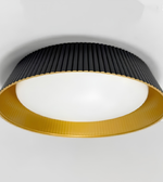 Ceiling light fixture with black and gold design on a white background