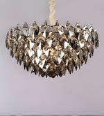 Decorative chandelier with crystal-like design on a plain background