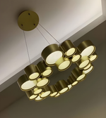 Modern gold chandelier hanging from the ceiling