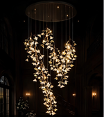 Decorative chandelier with floral design in a dark room