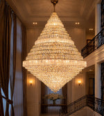 Royal pyramid tiered glass crystal chandelier in a grand double height luxury interior